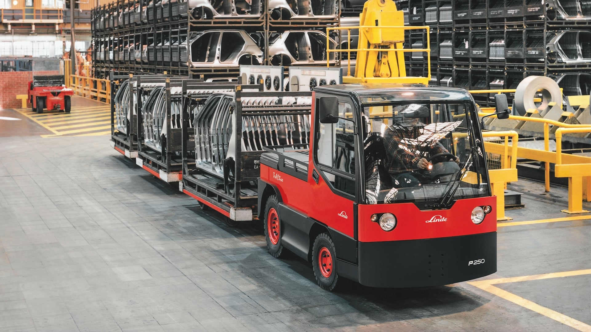 Tow tractors and platform trucks | Linde Material Handling